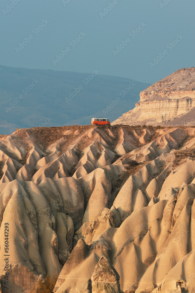 Stunning view of some rock formations in the Red & Rose Valley in Cappadocia during a beautiful sunrise. Goreme, central Anatolia, Turkey