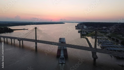 sunset over the clark bridge on the Mississippi river - Alton, Illinois photo