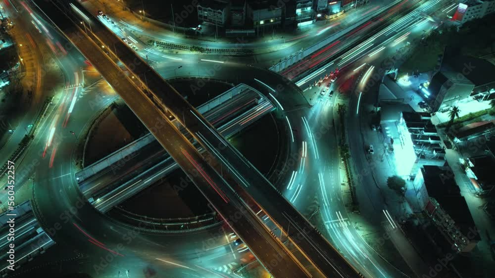 Traffic an important infrastructure, financial technology, Expressway top view, traffic transportation above intersection road in city night sky aerial view cityscape of advanced innovation,Hyperlapse Traffic an important infrastructure, financial technology, Expressway top view, traffic transportation above intersection road in city night sky aerial view cityscape of advanced innovation,Hyperlapse