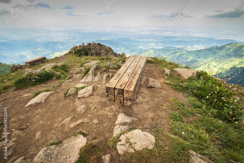 A place with a bench for a halt on Mount Furmanov in the Almaty mountains.