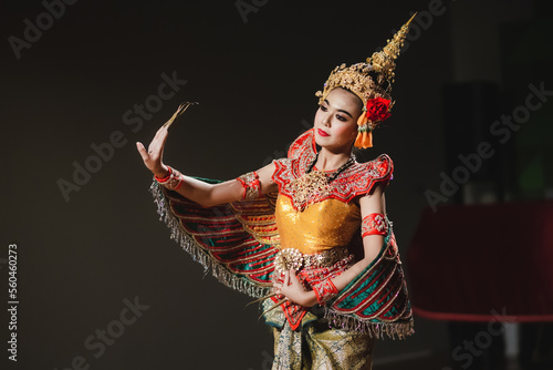 Thai classical dance performance Manohra Buchayan.Art culture Thailand Dancing in masked khon.Thai dance performance.Thai show.The khon portrait.Portrait gray background.Thai dacnce.(Portrait Ms shot)