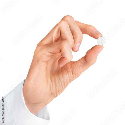 Doctor hand holding white pill isolated on white or transparent background. Pharmacy, pharmacology, medicine.