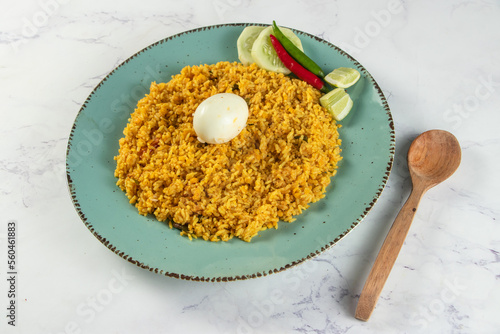 spicy Egg pulao, polao, biryani, mandi, kacchi with egg and salad served in dish isolated on table top view of indian food photo