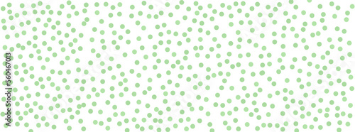 Color green seamless retro polka dots pattern. Hand painted with light painted dots. Grunge baby Wallpaper Watercolor confetti background.