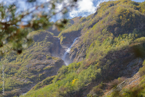 Tana glacier in North Ossetia, mountain waterfalls in the highlands