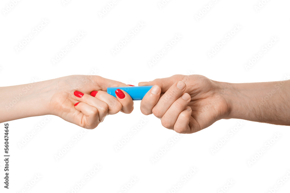 Rechargeable battery offer from a male hand to a female, isolate on a white background. Rechargeable battery offer from a male hand to a female, isolate on a white background.