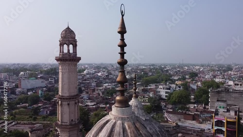 Aerial drone shot of old mosque in between the city of lucknow  photo