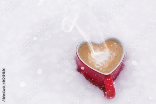 Fototapeta Naklejka Na Ścianę i Meble -  heart shaped coffie on snow