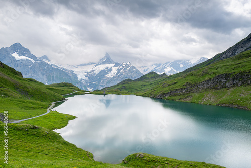 Bachalpsee and the Swiss Alps in the background on a cloudy summer day