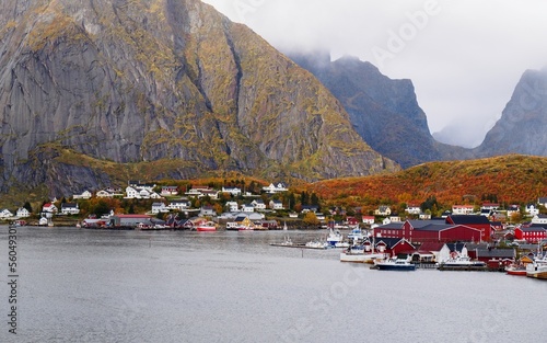 Beautiful Norwegian landscape with a traditional houses and cloudy sky.Norwegian fjord.