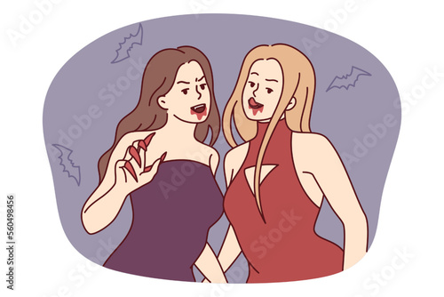 Women vampires with sharp claws and traces of blood near mouth stand among scary flying mice..Girl friends in evening dresses with fangs like zombies as Halloween decorations. Flat vector design 