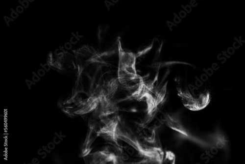 White steam smoke on solid black background with abstract blur motion wave swirl use as an overlay effect for vapor cigarette dry ice hot water and food soup