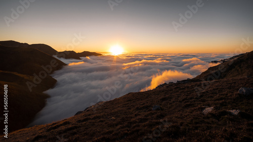 Above the clouds  in the top of mountain, with a sea of clouds below us © Adrian Iglesias