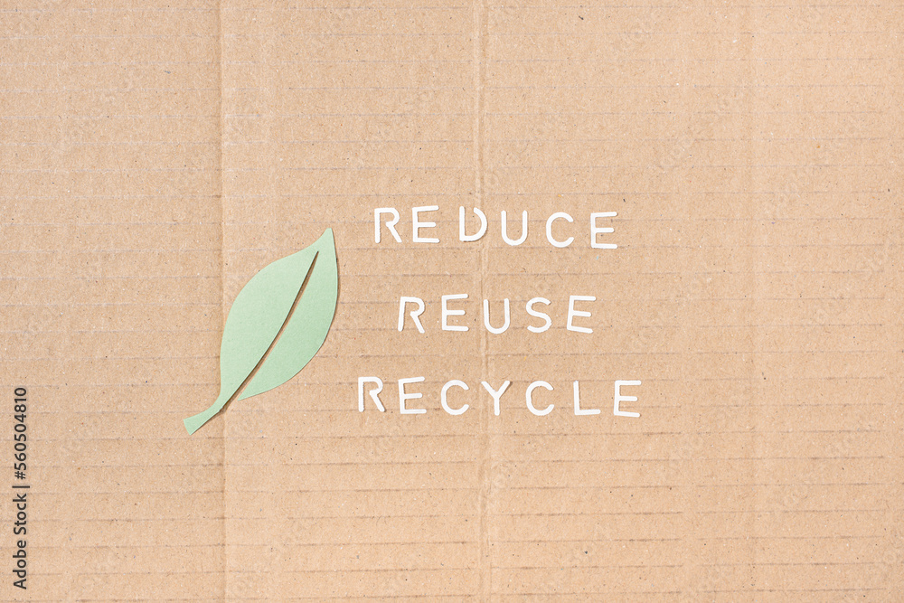 Reduce Reuse Recycle concept. Leaf and Paper strips with cut out text ...