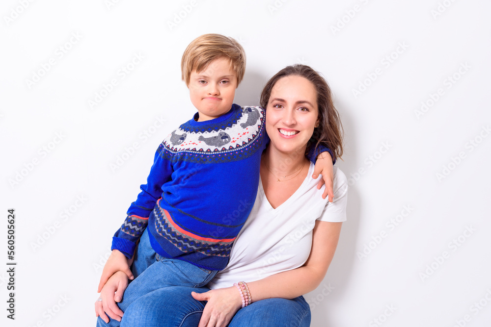 boy playing with her mother on studio white background