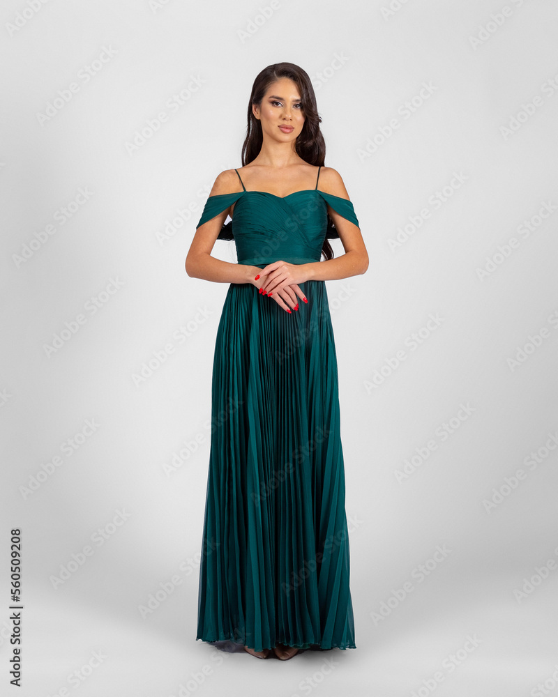 a model in an elegant evening dress dress