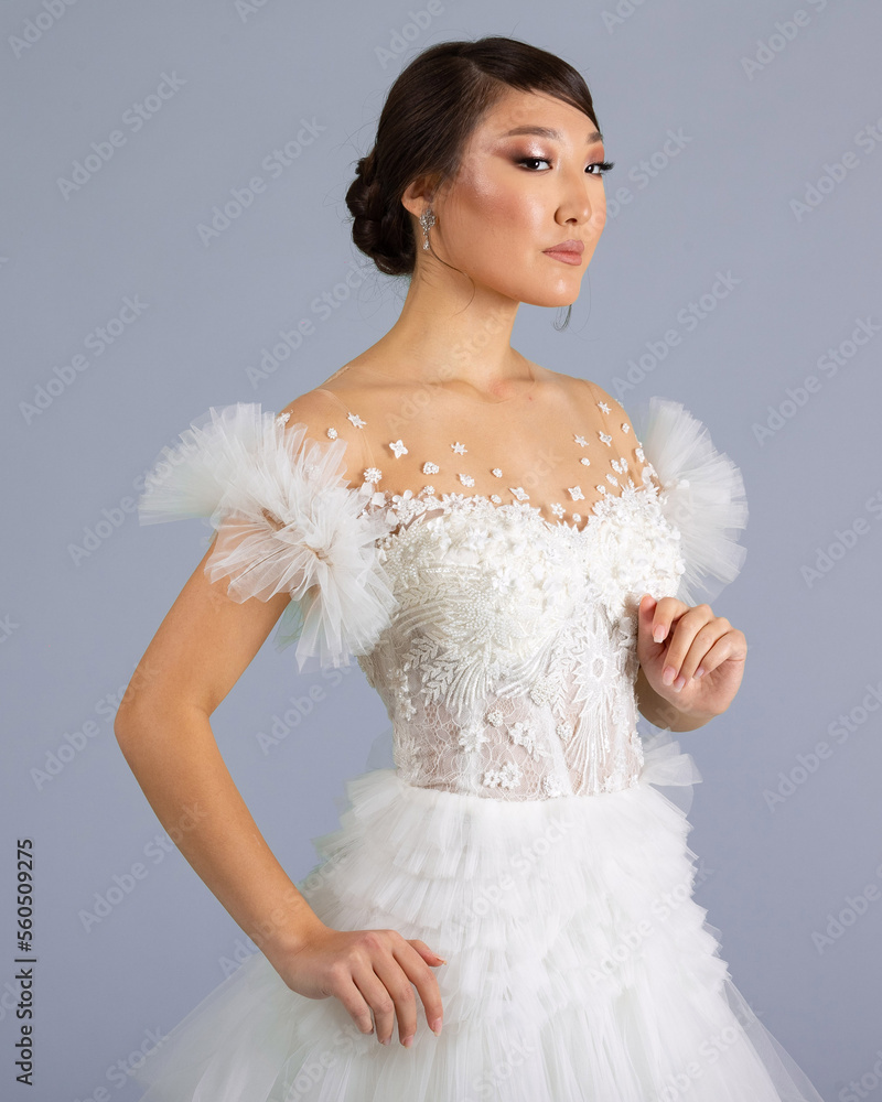 Elegant bride in a wedding dress Elegant bride in a wedding dress