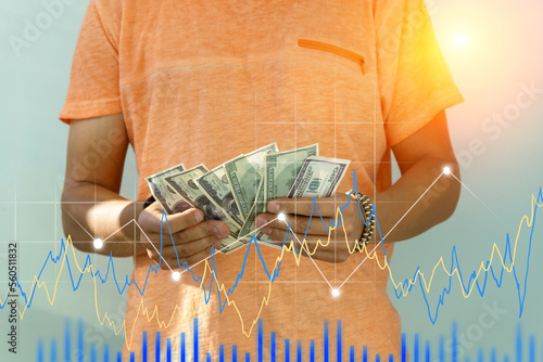 Man holds dollars in his hands. Price growth chart, investments, cryptocurrency, new money,