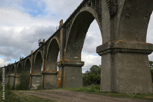View of the abandoned old Mokrinsky railway bridge. Russia, the village of Mokry, the bridge was built in 1918