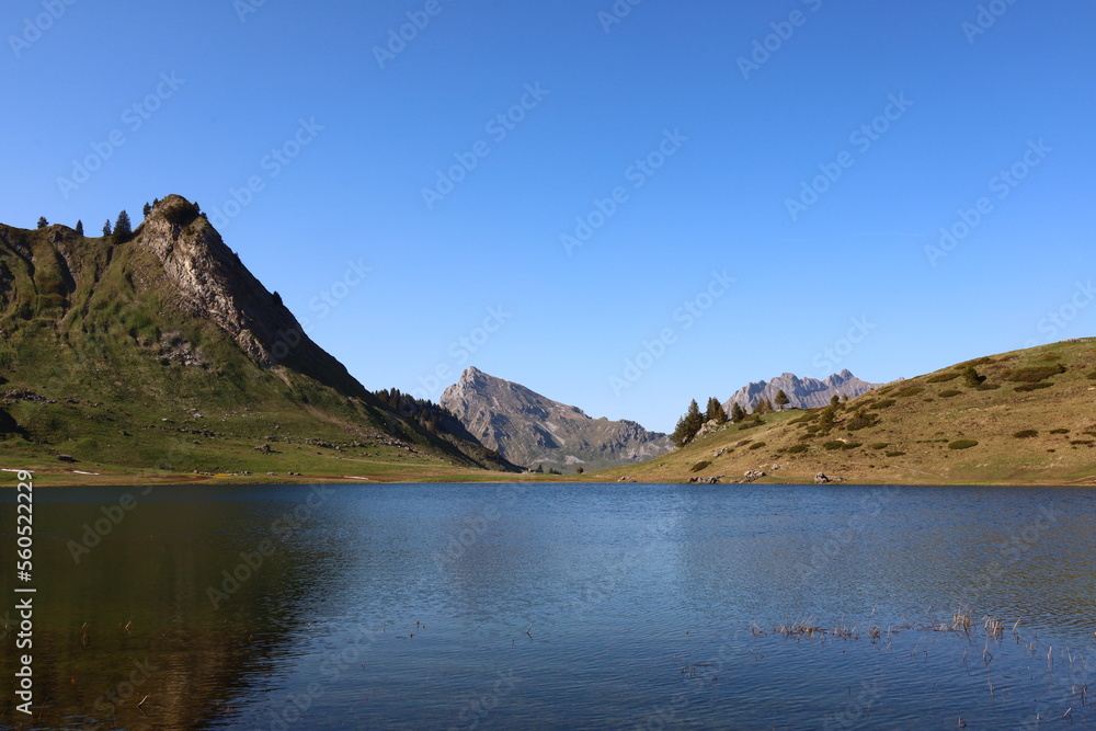 View on the Roy Lake in Haute-Savoie, it is located 2 km west of le Praz de Lys