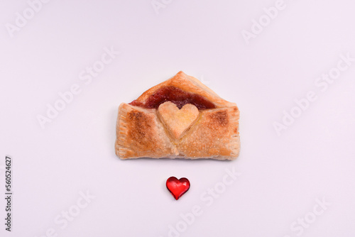 puff pastry bun in the form of a letter with a heart