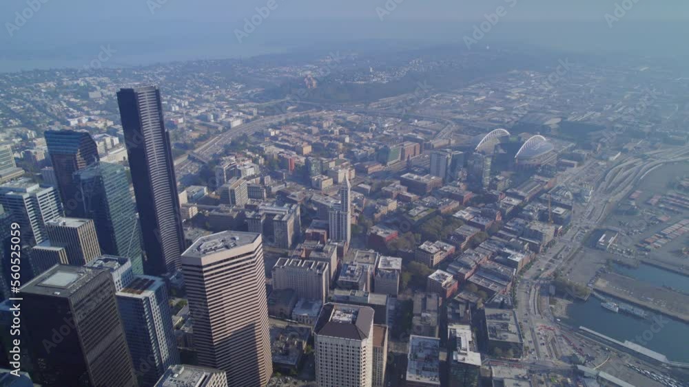 Aerial view of downtown Seattle in Washington state. Skyscrapers of buissnes centr in Seattle. Night view of the buildings of big city. Aerial view of downtown Seattle in Washington state. Skyscrapers of buissnes centr in Seattle. Night view of the buildings of big city.