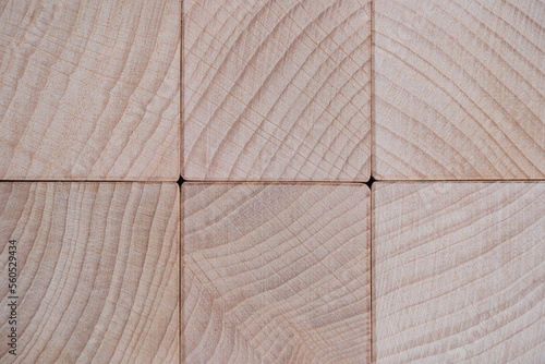 Background, wooden beech texture of end of square cubes.