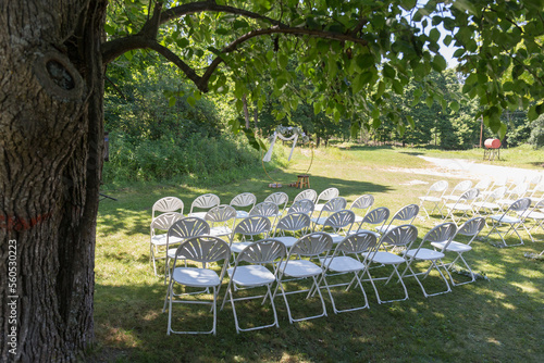 Event design elegant setup chair wedding open public space rental green grass simple 