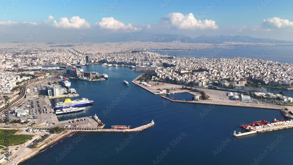 Aerial drone video of famous and busy port of Piraeus where passenger ferries travel to Aegean destination islands as seen from high altitude, Attica, Greece Aerial drone video of famous and busy port of Piraeus where passenger ferries travel to Aegean destination islands as seen from high altitude, Attica, Greece