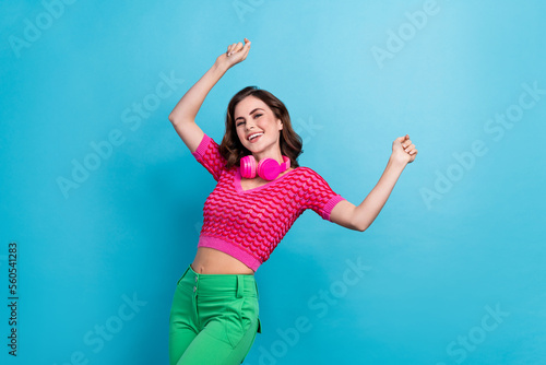 Photo of carefree crazy funky lady dressed pink stylish clothes good mood enjoy quality device purchase isolated on blue color background