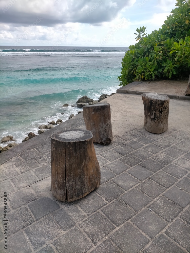 bench on the beach with ocean background bench on the beach with ocean background
