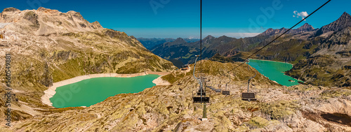 High resolution stitched panorama with reflections in a lake at the famous Weisssee Gletscherwelt, Uttendorf, Salzburg, Austria photo