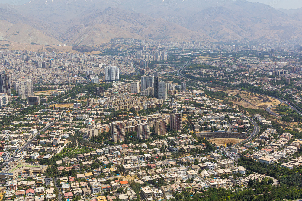 Aerial view of Alborz mountains and Tehran, capital of Iran.