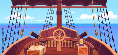 Fényképezés Ship deck view with a steering wheel, canons, and a mast with black sails