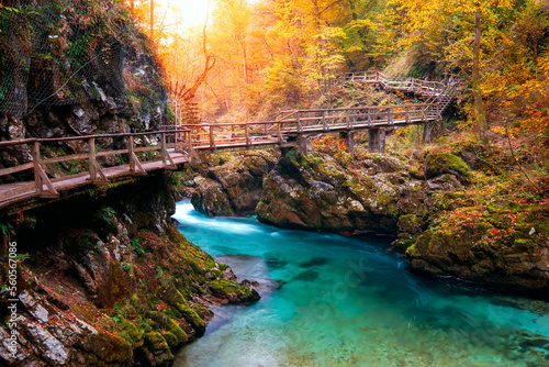 Famous and liked Vintgar gorge near Lake Bled in autumn colors at sunset, Julian Alps, Triglav National Park