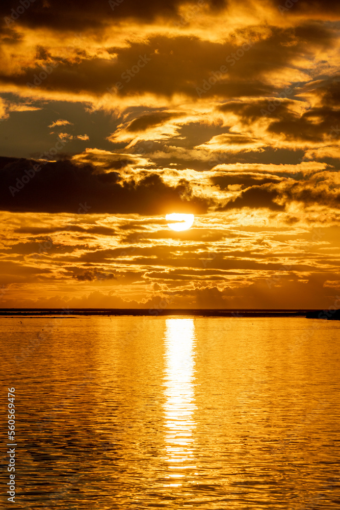 Fototapeta premium Orange sunset clouds with beautiful sun sky scape 