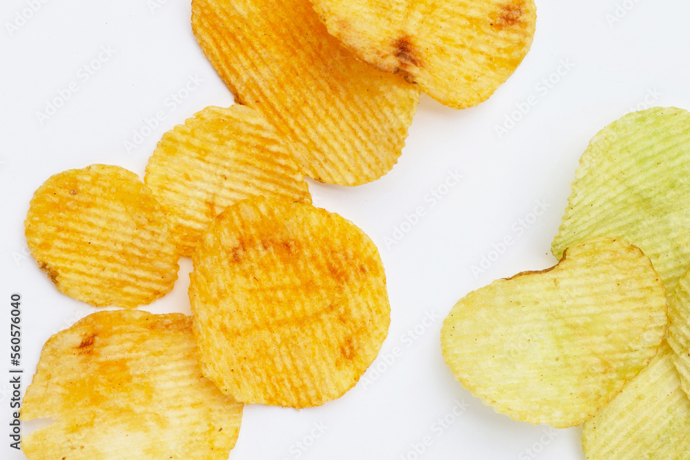 Potato chips on white background. Potato chips on white background.