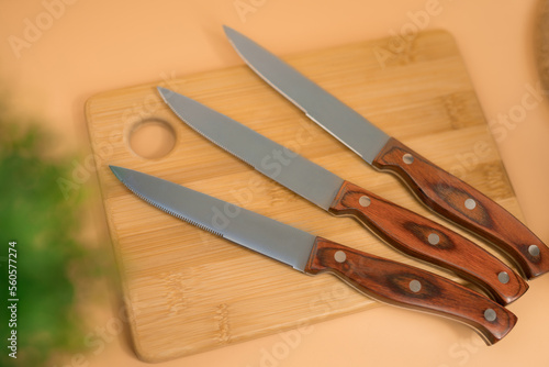 steak knives on a cutting board, kitchen knives, template