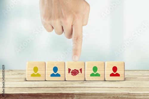 Business concept, wooden cubes with icons on the desk