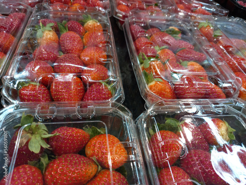 Fresh strawberries. Harvest strawberries on the counter of the supermarket.