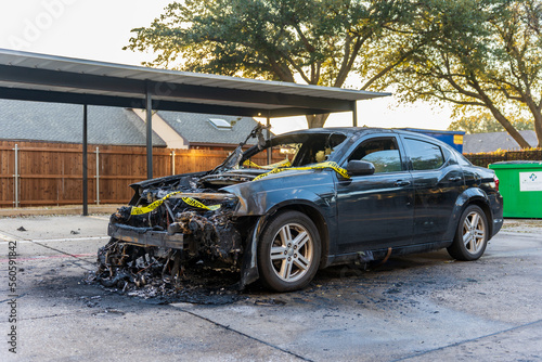 Burnt car in the parking lot in Dallas, Texas