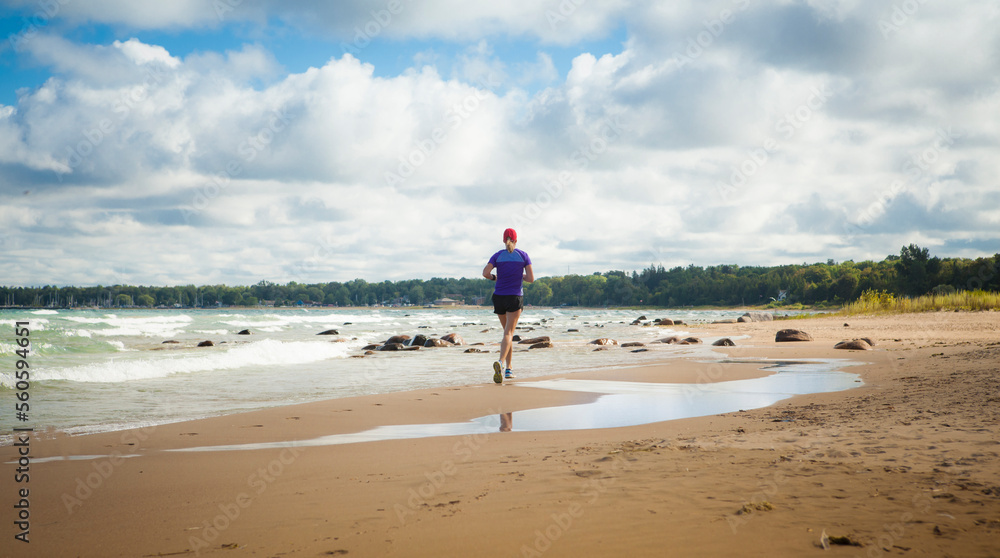 Woman jogging on the beach