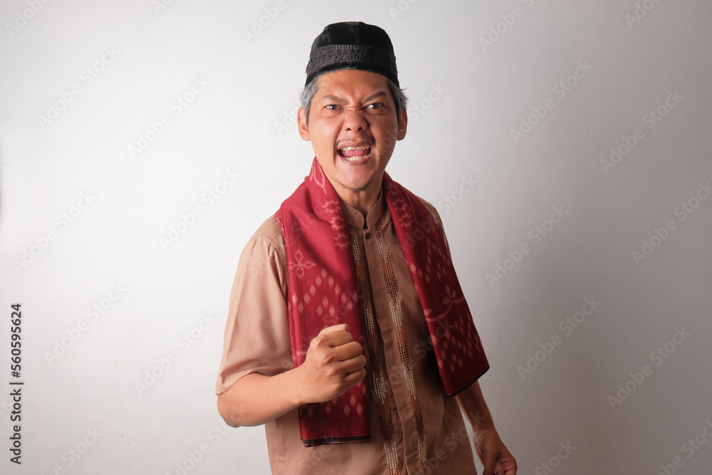 happy asian muslim man clenched his hands happy asian muslim man clenched his hands