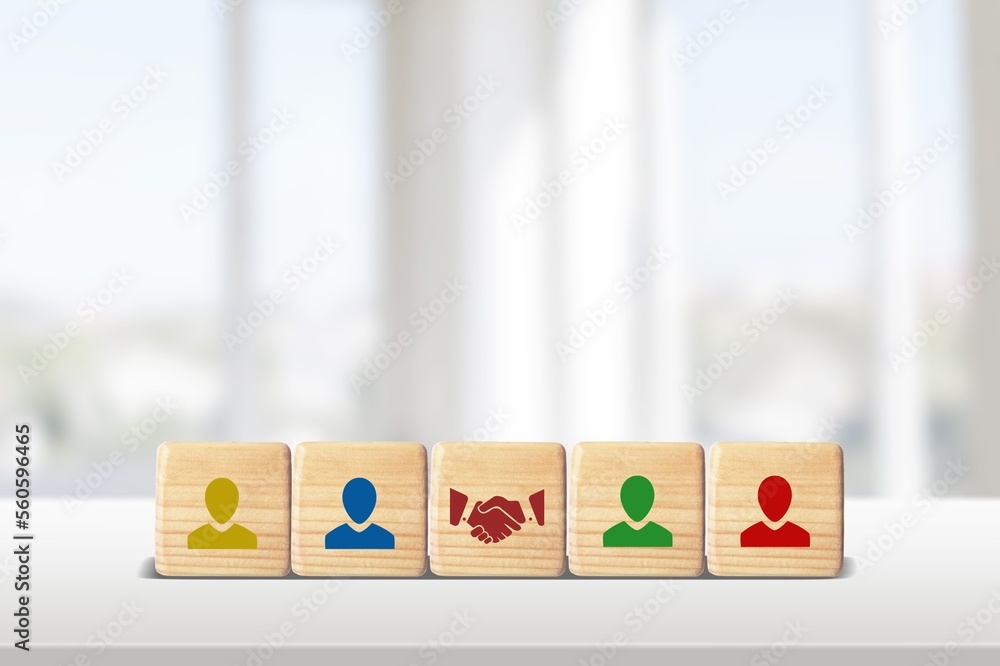 Business concept, wooden cubes with icons on the desk - obrazy, fototapety, plakaty 