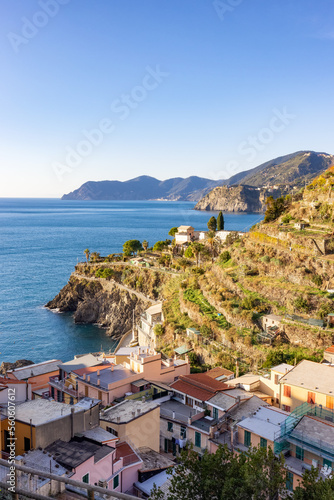 Small touristic town on the coast and farmland, Manarola, Italy. Cinque Terre. Sunny Fall Season day.