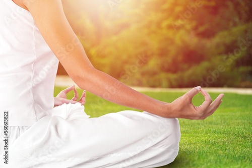 Wallpaper Mural Young female relaxing and meditating outdoors. Torontodigital.ca