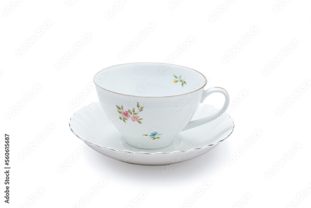 Empty white ceramic mug. Decorative flower pattern with one handle cup isolated on white background. Modern mug tea, coffee, or milk. Shiny bright color glazed vintage handmade for drinking water. Empty white ceramic mug. Decorative flower pattern with one handle cup isolated on white background. Modern mug tea, coffee, or milk. Shiny bright color glazed vintage handmade for drinking water.