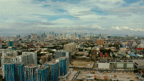 Skyscrapers and business centers in a big city Manila top view. Modern metropolis in Asia, top view.