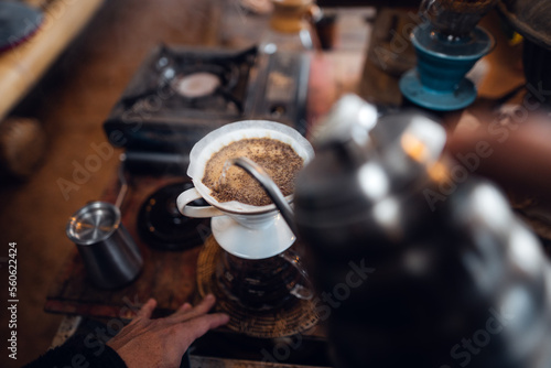 Closeup of hands barista make coffee