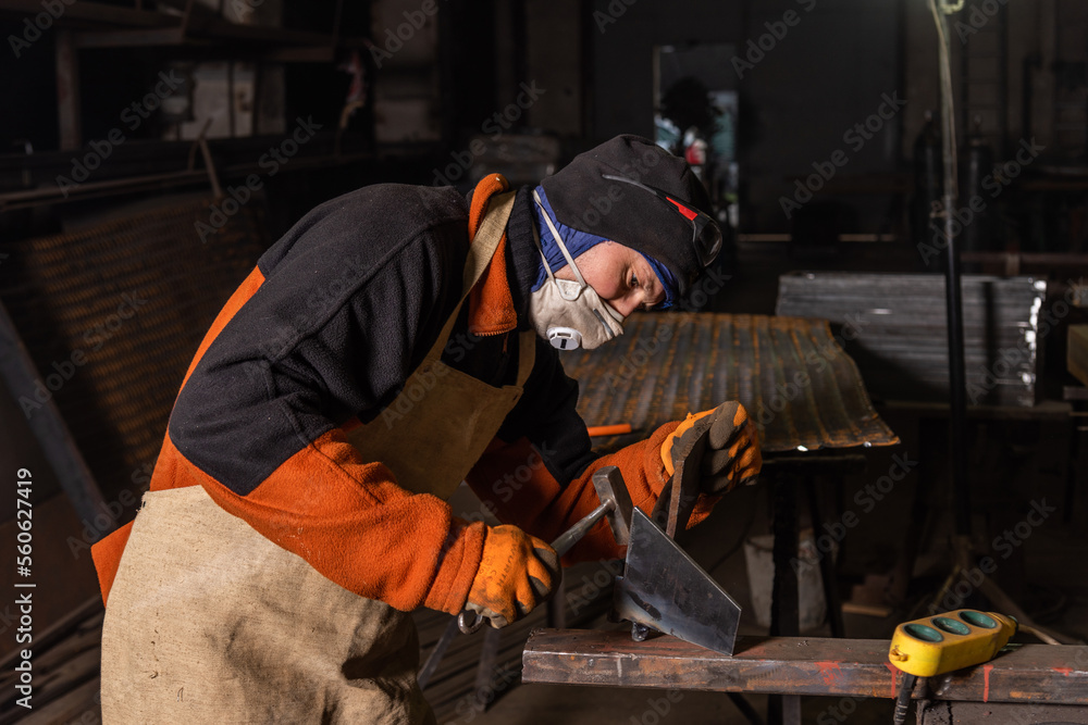 Fototapeta premium Work in a mechanical workshop with various tools
